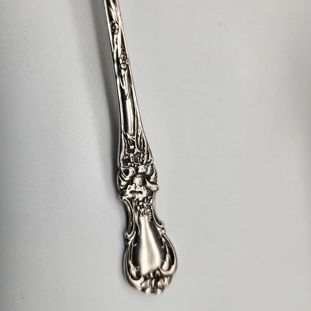 Silver serving fork by R. Wallace 1835 A1 Blossom pattern 8.75